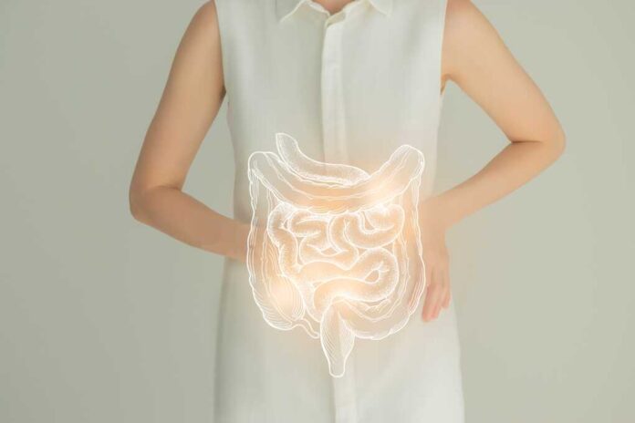 Unrecognizable,Female,Patient,In,White,Clothes,,Highlighted,Handrawn,Intestine,In