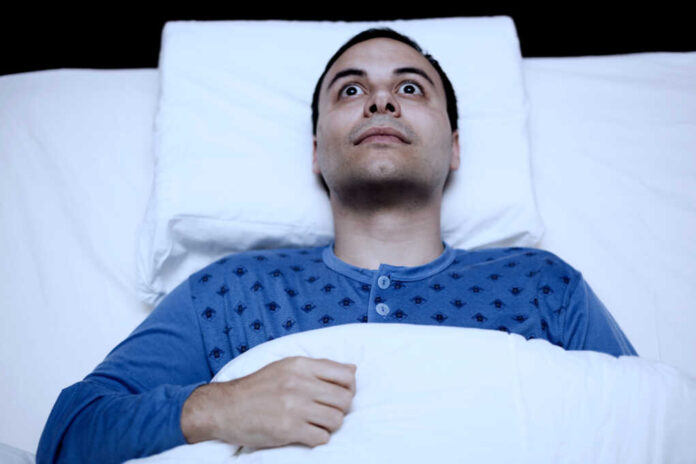 Portrait,Of,An,Insomniac,Man,Trying,To,Sleep,In,His