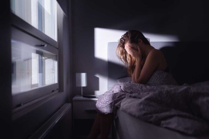 Sad,Depressed,Woman,In,Bed.,Lonely,Person,With,Stress,,Insomnia