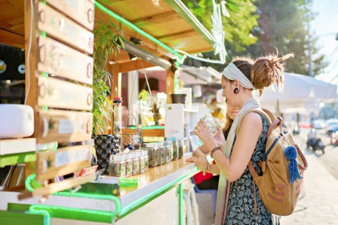 Two,Female,Tourists,Shopping,For,Marijuana,At,Legal,Cannabis,Shop