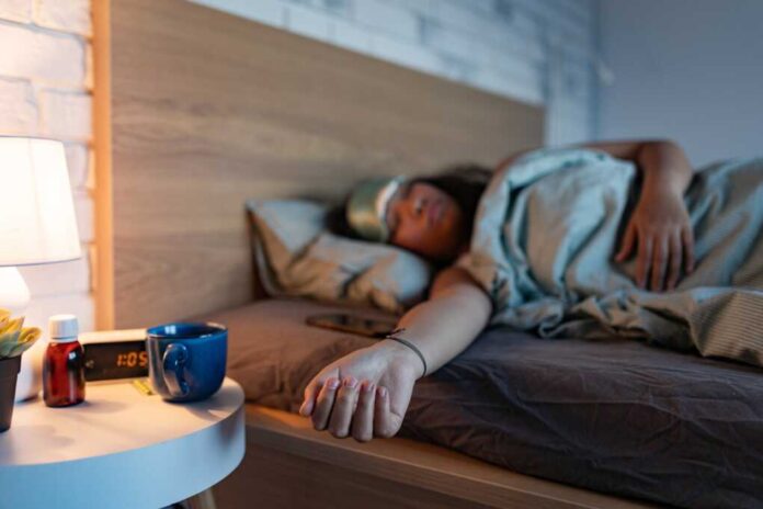 Woman,Sleeping,With,Sleep,Mask,,Using,Sleeping,Pills,,Melatonin.,Concept