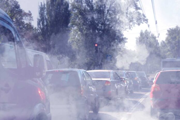 Environmental,Pollution.,Air,Contaminated,With,Fumes,In,City.,Cars,Surrounded