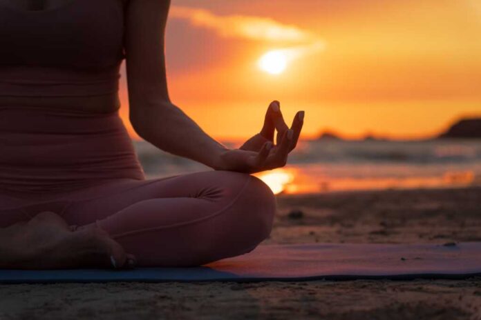 Hand,Of,A,Woman,Meditating,In,A,Yoga,Pose,On