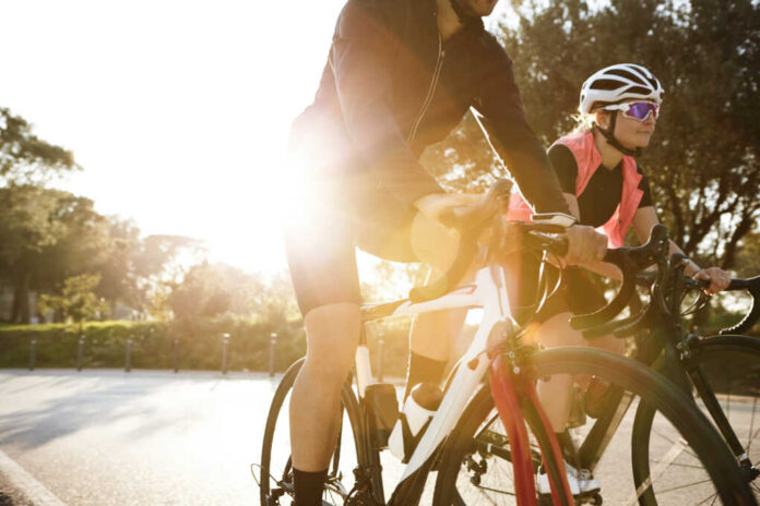 Cropped,View,Of,Unrecognizable,Male,Cyclist,Having,Evening,Ride,At