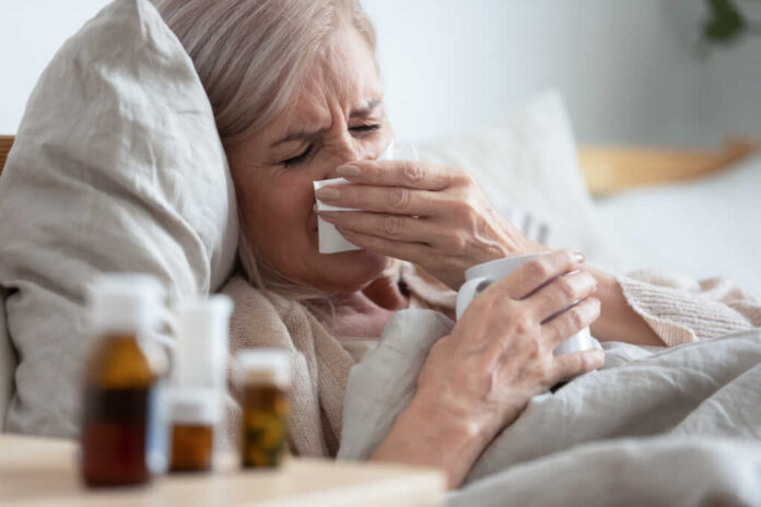 Ill,Sick,Middle,Aged,Woman,Sneezing,Blowing,Running,Nose,Holding