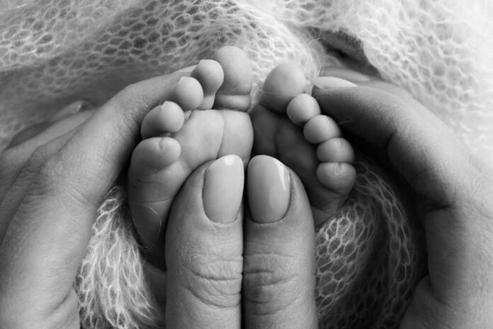 Mother,Is,Doing,Massage,On,Her,Baby,Foot.,Closeup,Baby