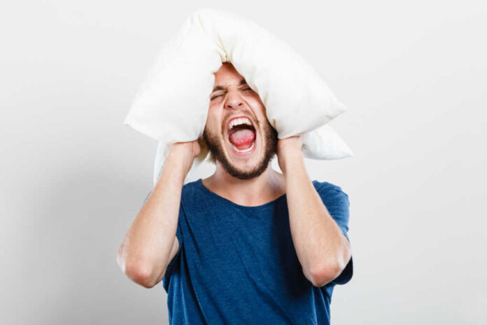 Stressful,Unpleasant,Situation,Conflict.,Angry,Mad,Young,Man,Closing,Ears