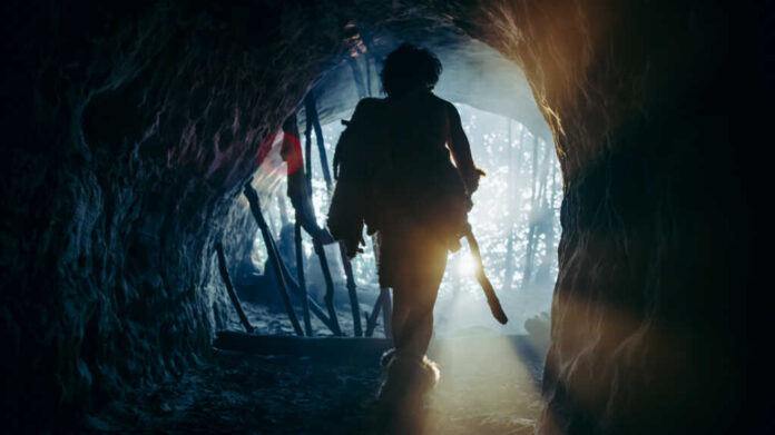 Primeval,Caveman,Wearing,Animal,Skin,And,Fur,Holds,Stone,Tipped