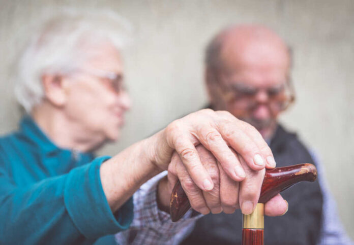 Old,Couple.,Old,Man,An,Woman,Still,Together,Holding,Each