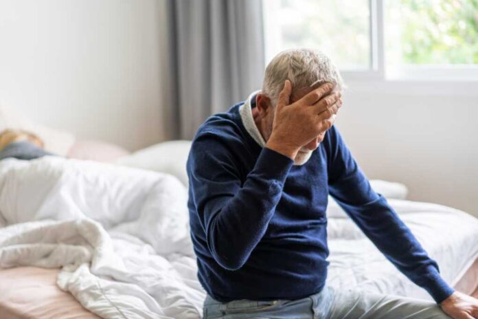 Sick,Unhappy,Senior,Elderly,Man,Touching,Head,Serious,Depressed,Feeling