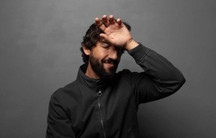 Looking,Stressed,,Tired,And,Frustrated,,Drying,Sweat,Off,Forehead,,Feeling