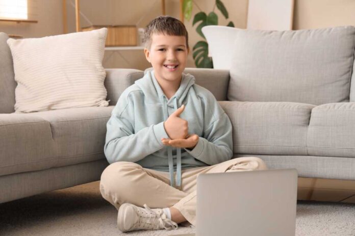 Mute,Boy,Using,Sign,Language,During,Video,Call,At,Home