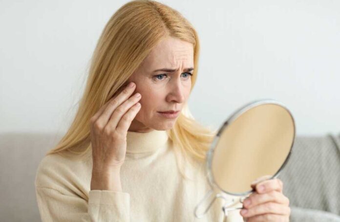 Anti-wrinkle,Skin,Care.,Sad,Woman,Looking,In,Mirror