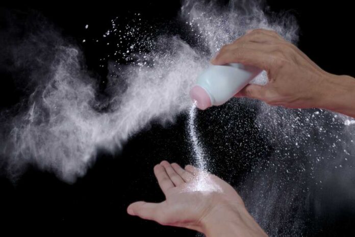 Hand,Holding,A,Powder,Bottle,And,Pouring,It.,Put,Graphics