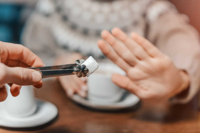 A,Woman,In,A,Cafe,Refuses,A,Piece,Of,White