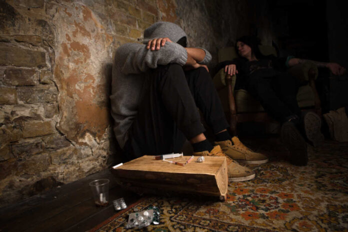 Drug,Addict,Man,And,Woman,Sleeping,After,Using,Different,Types