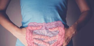 Person holding their stomach with a graphic of intestines overlayed
