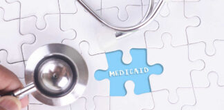 A stethoscope next to a puzzle piece labeled 'Medicaid'