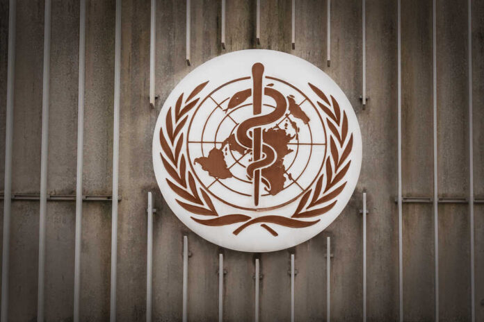 World Health Organization emblem featuring a globe and caduceus