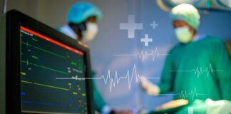 Medical professionals in an operating room monitoring a patient