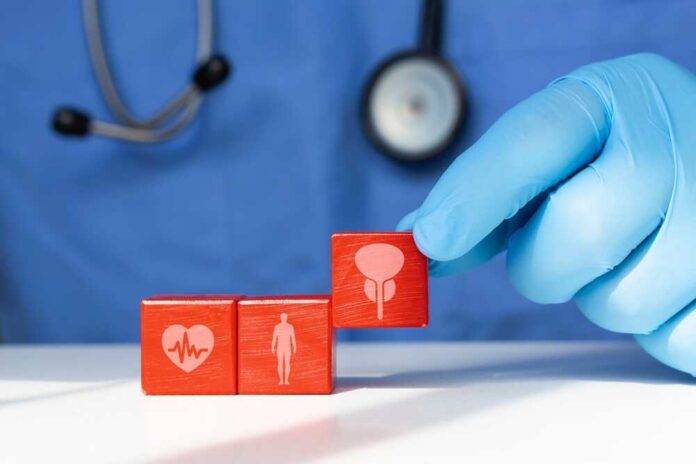 A doctor's gloved hand placing red blocks with health symbols on a table