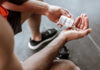 Creatine: Fountain of Youth or Overhyped? Person pouring probiotic pills into their hand