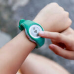 Person using a fitness tracker on their wrist