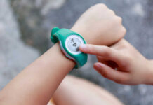 Person using a fitness tracker on their wrist