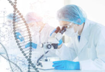 Scientists Reveal Hidden Biological Aging Cliff Scientist examining samples under a microscope in a laboratory
