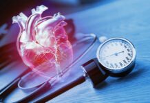 GLP-1 Drugs’ Hidden Impact On Blood Pressure An anatomical heart illustration next to a blood pressure monitor