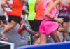 Elite Athletes’ Secret to Better Endurance Runners participating in a marathon, wearing colorful athletic gear