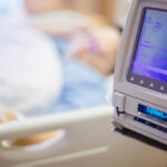 Swallow And Stop Breathing! — Ultra-Rare Heart Condition IV pump displaying medication flow rate in a hospital room