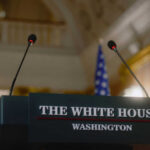 Trump’s Health, Fraud and More at White House Press Briefing Press podium with microphones and an American flag in the background