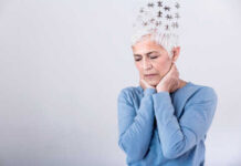 How Your Biological Clock Impacts Your Mood Elderly woman with a unique hairstyle made of puzzle pieces, looking thoughtful