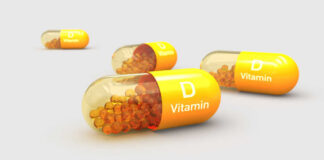 Vitamin D capsules with orange beads inside