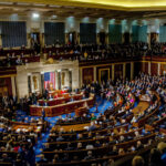 FDA Buried Vaccine Red Flags, Senators Charge A large gathering of officials in a congressional chamber during a legislative session