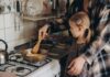 CDC Warning: Kitchen Habits That Cause Foodborne Illnesses Child cooking with adult at a stove