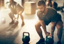 Tiny Workout Molecule Hints At Diabetes Breakthrough Man lifting a kettlebell in a gym