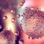 Daily Habits That Quietly Increase Cell Inflammation Microscopic view of virus-like particles with spiky surfaces