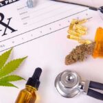 Medical prescription with cannabis, pills, and a stethoscope