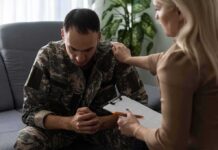 How To Break Up With Your Therapist Without Ghosting Soldier in camouflage receives support from a counselor