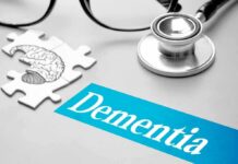 Metabolism Clues That Predict Dementia Risk Stethoscope and brain puzzle piece on desk
