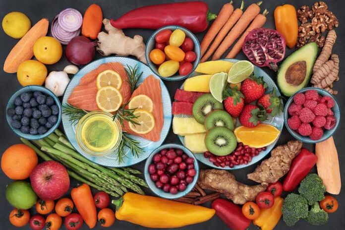Assorted fruits, vegetables, and salmon slices on plates