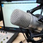 Close-up of a studio microphone in a shock mount