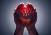 22-Year Time Capsule Baby Stuns Doctors Hands cupping a glowing fetal silhouette