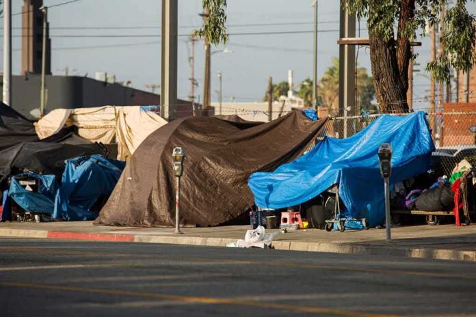 Street tents covered with tarps along a sidewalk