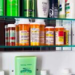 Ozempic’s Violence Twist Stuns Researchers Medicine cabinet with prescription bottles and toiletries