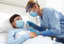 Kids on Ozempic: Hidden Deficiency Spike Nurse checks temperature of hospitalized boy