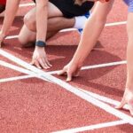 Runners at the starting line on a track