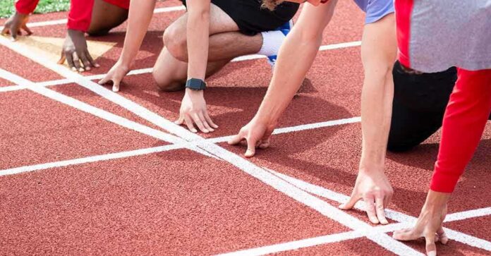 Runners at the starting line on a track